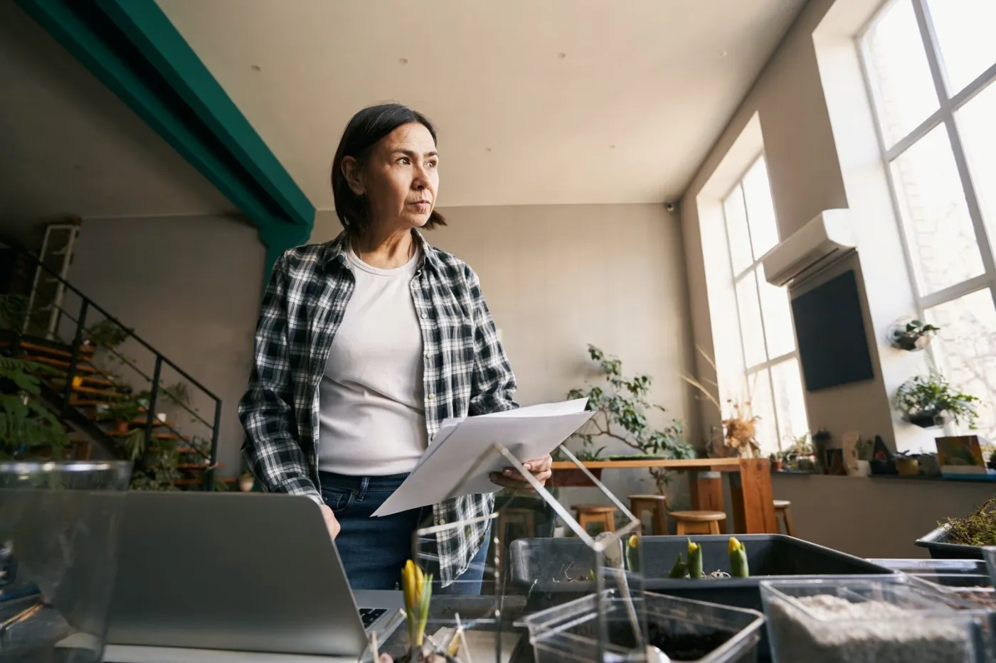 Woman working on a tablet in a studio office