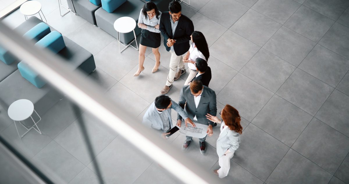 Corporate teamworking colleagues in modern office