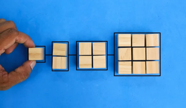 a wooden cube with a stacked structure.