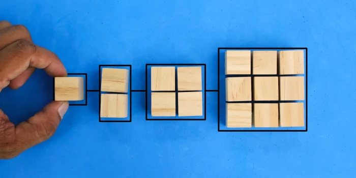 a wooden cube with a stacked structure.