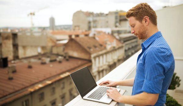 Businessman working on rooftop