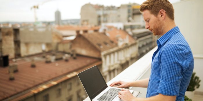 Businessman working on rooftop