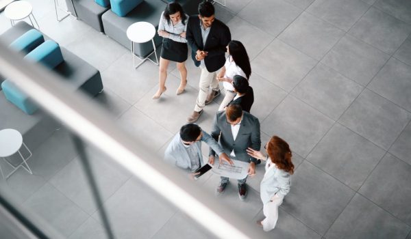 Corporate teamworking colleagues in modern office