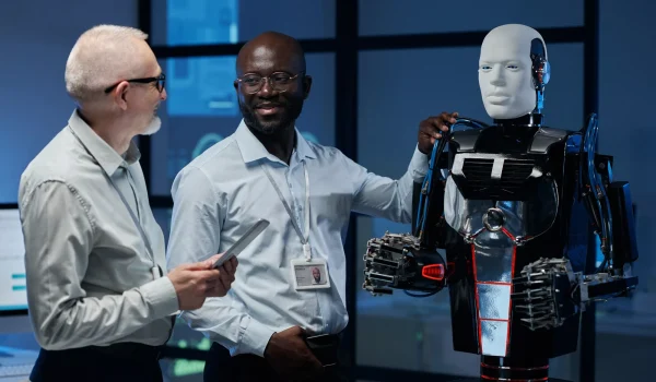 Engineers discussing artificial intelligence in lab