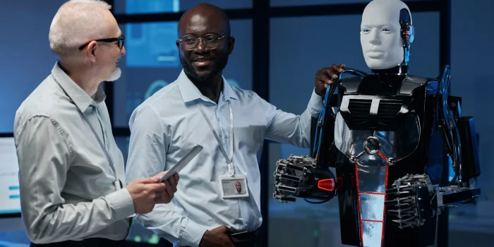 Engineers discussing artificial intelligence in lab