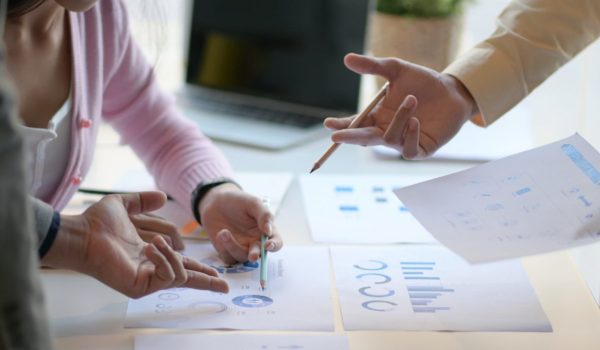 The marketing team is analyzing the future market situation to plan for the next step.