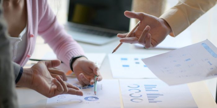 The marketing team is analyzing the future market situation to plan for the next step.